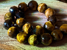 Load image into Gallery viewer, 10mm Faceted Tiger Eye beads
