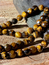 Load image into Gallery viewer, 6mm Faceted Tiger Eye beads
