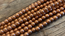 Load image into Gallery viewer, Matte Metallic Wood Beads
