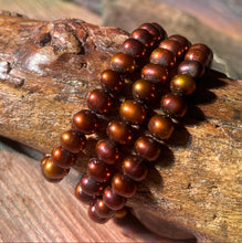 Load image into Gallery viewer, 6mm Amber/Reddish Gold Freshwater Pearls RARE
